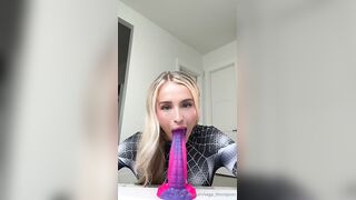 Vega Thompson Rides A Large Toy In Her Spider-Woman Suit